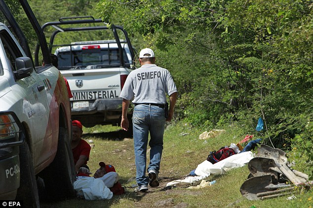 Mexico hit by student massacre: At least 17 anti-corruption protesters ’rounded up, murdered and dumped in a mass grave’ – and another 26 are missing