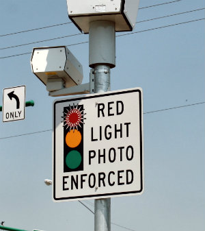 Red Light Cameras CEO Paid Off City Officials to Keep Cameras Up
