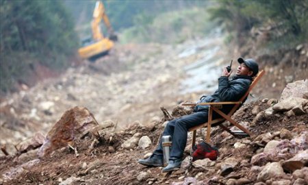 Man diagnosed with cancer uses life savings to build a road for his village versus treating cancer