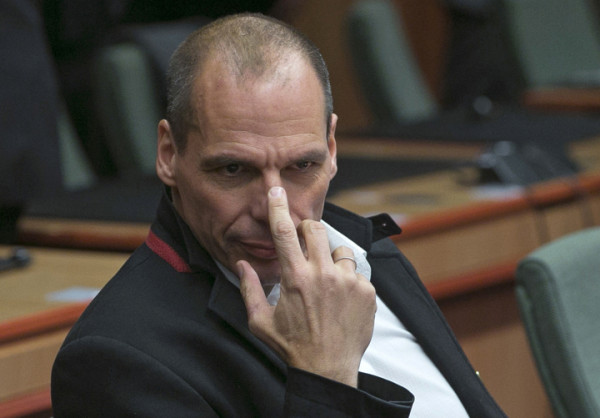 Greek Finance Minister Yanis Varoufakis waits for the start of an extraordinary euro zone Finance Ministers meeting (Eurogroup) to discuss Athens' plans to reverse austerity measures agreed as part of its bailout, in Brussels February 20, 2015. Greece has made every effort to reach a mutually beneficial agreement with its euro zone partners but will not be pushed to implement its old bailout programme, its government spokesman said on Friday. REUTERS/Yves Herman (BELGIUM - Tags: POLITICS BUSINESS TPX IMAGES OF THE DAY) - RTR4QGAY