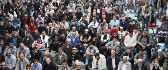 BERLIN, GERMANY - SEPTEMBER 19: Muslims gather for Friday prayers on the street outside the Mevlana Moschee mosque on a nation-wide action day to protest against the Islamic State (IS) on September 19, 2014 in Berlin, Germany. Muslims across cities in Germany followed a call by the country's Central Council of Muslims to protest against the ongoing violence by IS fighters in Syria and Iraq. (Photo by Sean Gallup/Getty Images)