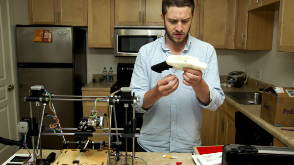 Cody Wilson works on the first completely 3D-printed handgun, The Liberator, at his home in Austin on Friday May 10, 2013. (AP Photo/Austin American Statesman, Jay Janner) AUSTIN CHRONICLE OUT, COMMUNITY IMPACT OUT, INTERNET MUST CREDIT PHOTOGRAPHER AND STATESMAN.COM
