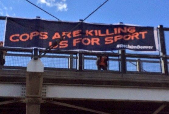 “Cops Are Killing Us For Sport” Banner Drop Ahead of NFL AFC Championship