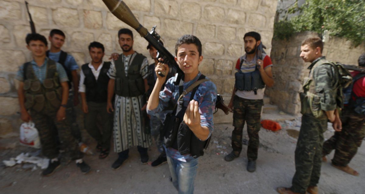 Syrian rebels once supported by U.S. appear to behead child in video