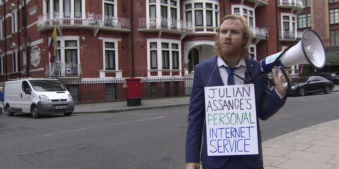Hero With a Bullhorn Reads the Internet to Julian Assange From the Sidewalk