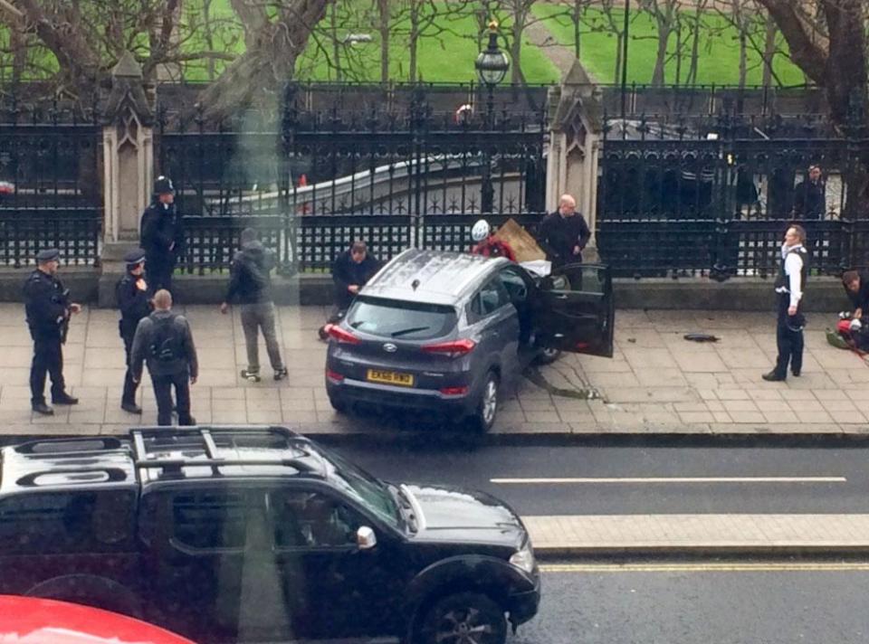 Car Crashes Into Parliament Gates