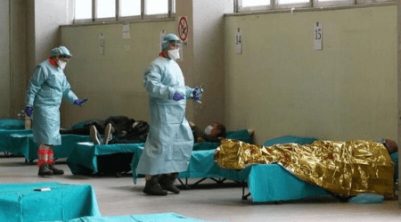 “One Step Away From Collapse”: Hospitals in Italy Overwhelmed by COVID-19